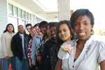 Paige Clausius-Parks (right) with the met center guests